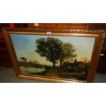 A gilt framed oil on canvas rural scene.