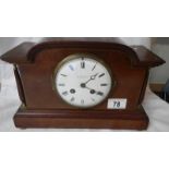 A mahogany inlaid mantel clock with good French movement, complete with key and pendulum,