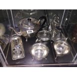 A silver plate tea set, toast rack etc.