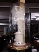 A Grecian style figure under glass dome.