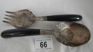 An unusual pair of salad servers (possibly foreign silver).