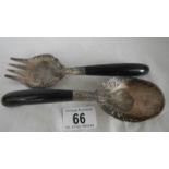 An unusual pair of salad servers (possibly foreign silver).