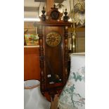 A mahogany Vienna wall clock.