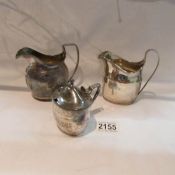 2 silver milk jugs and a silver mustard pot (missing liner).