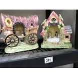 A pottery musical cottage possibly displaying characters from Alice Through the Looking Glass and a