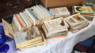 A quantity of paperback novels by Joyce Grenfell, Joanna Trolloppe etc.