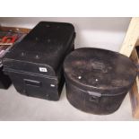 A hat storage tin and 1 other storage tin