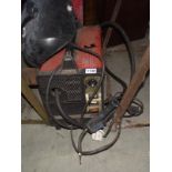 A Mig welder and mask