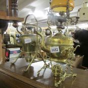 2 brass spirit kettles on stands.