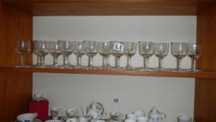 A quantity of small drinking glasses etched with R.A.F.