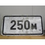 A '250M' aluminium reflective road sign