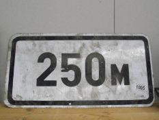A '250M' aluminium reflective road sign
