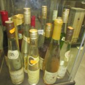 14 bottles of various liquors including Mirabelle etc.