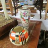 An art deco vase and a Chinese vase.