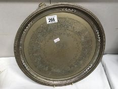 A silverplate footed tray dated 1880