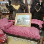 A mahogany framed chaise longue.