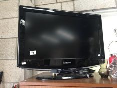 A 26" Samsung TV (no remote)