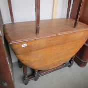 An oak gate leg table.