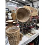 A quantity of wicker ware including a china vase encased in wicker