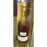 A bottle of cognac labelled Costello 1923.