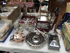 A collection of silver plate items including boxed spoons etc.