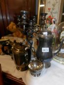 A mixed lot of silver plate including candelabra.