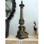 A classical style brass plated spelter lamp