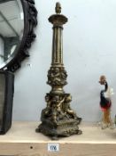 A classical style brass plated spelter lamp