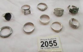 10 white metal rings including some silver.