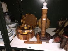 A number of turned wood bowls, a lamp base,