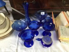 A quantity of blue glass dishes etc.