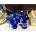 A quantity of blue glass dishes etc.