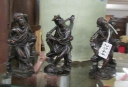 3 carved wood Chinese figures.