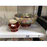 A large Maling floral decoration bowl and a small red and gold jug