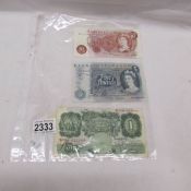 An old green £1 note, an old blue £5 note and a discontinued 10/- note, VGC.