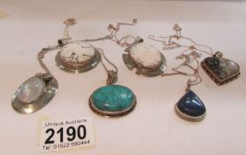 6 semi precious hard stone set pendants including Lapis, Turquoise, Moonstone, agate etc.