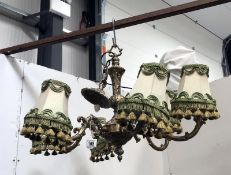 A 6 arm brass chandelier