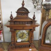 An oak cased bracket clock.