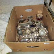 A box of assorted silver plate.