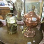 A copper samovar urn and a brass hot water can.
