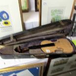 An early 19th century part restored violin with case and bow, all components present.