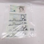 4 uncirculated £5 notes and 1 green Elizabeth II £5 note.