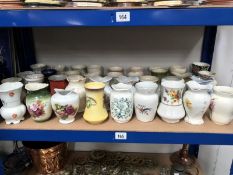 Approximately 36 vintage ceramic toothbrush pots