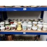 Approximately 36 vintage ceramic toothbrush pots