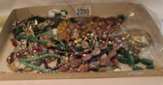 A mixed lot of costume jewellery including silver ring, vintage brooch with earrings etc.