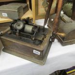 An Edison Standard phonograph, missing horn but in working order.