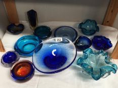12 pieces of mainly blue art glass bowls etc