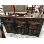 A dark oak sideboard