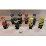 8 Carlton ware golfer figures.