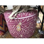 An Amy Kent pouffe (round pink design)